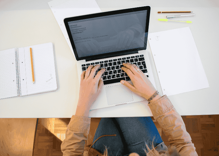 A Tech+ candidate registering for the exam on a laptop
