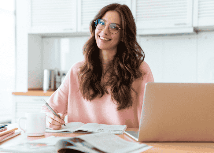 A person preparing for the Praxis PLT 5623 exam on a laptop