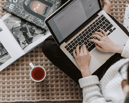 A person typic taking a Praxis 5422 practice test on a laptop