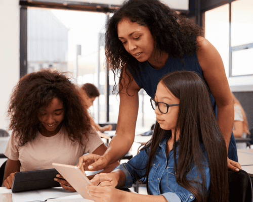 An elementary school teacher with her students