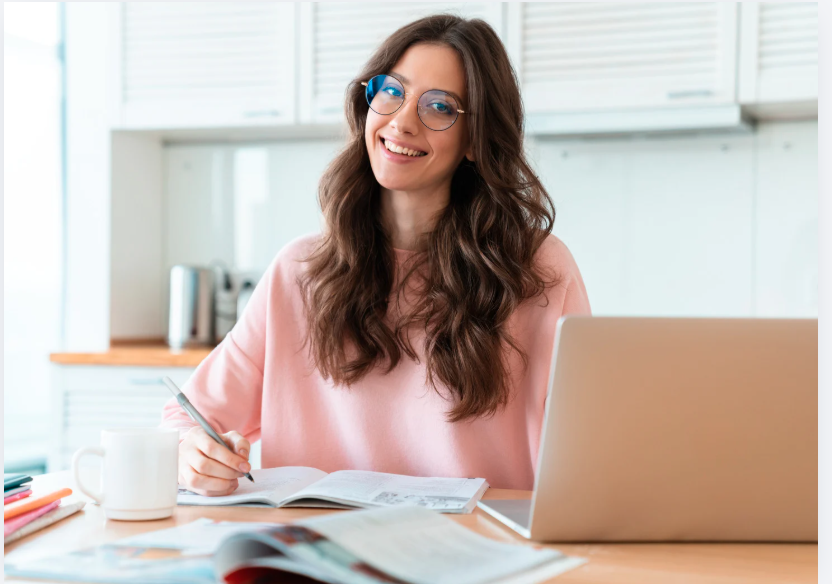 A person studying for the 5412 exam on a laptop