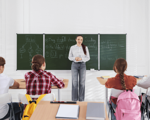 A teacher teaching English in a classroom