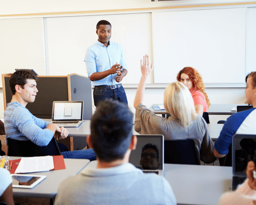A Citizenship education teacher with students in class