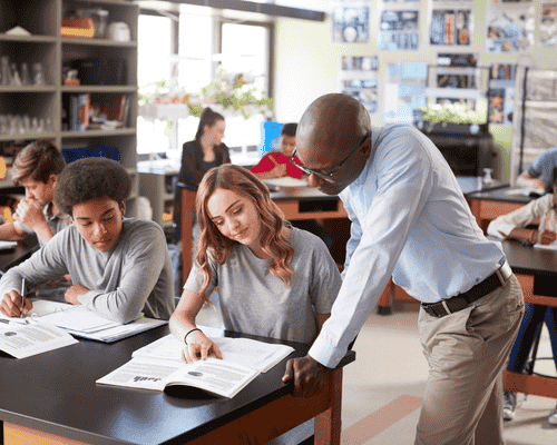 A consumner sciences teacher with students in class