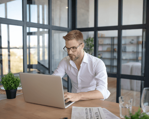 A person preparing for the CLEP Human Growth and Development exam on a laptop